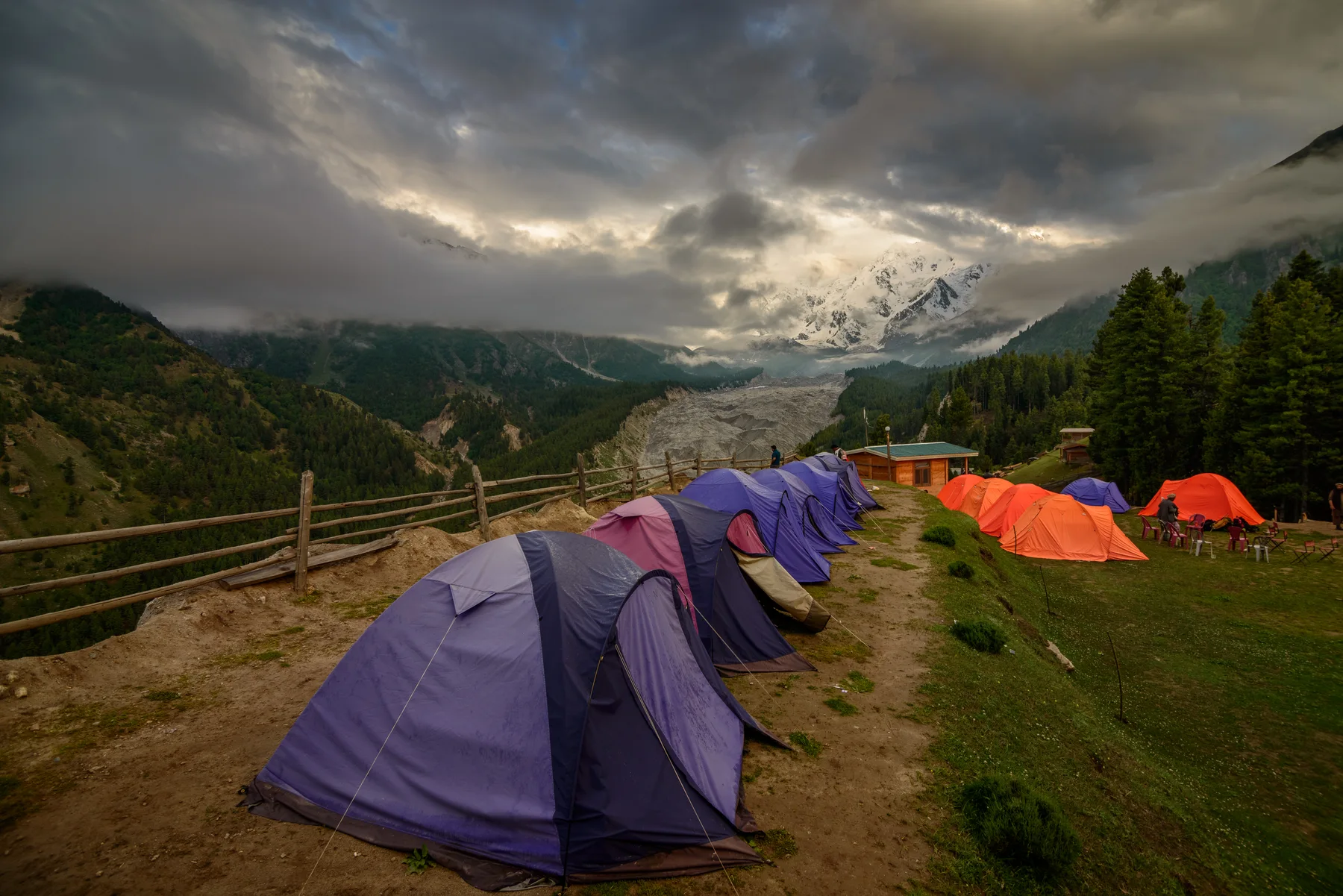Tents pitched at Fairy Meadows beneath mountain peaks